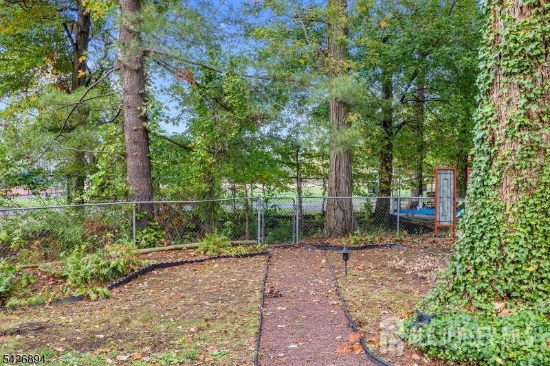 233 Maple Avenue Dunellen, NJ 08812 - Photo 38 of 39 a backyard of a house with lots of green space