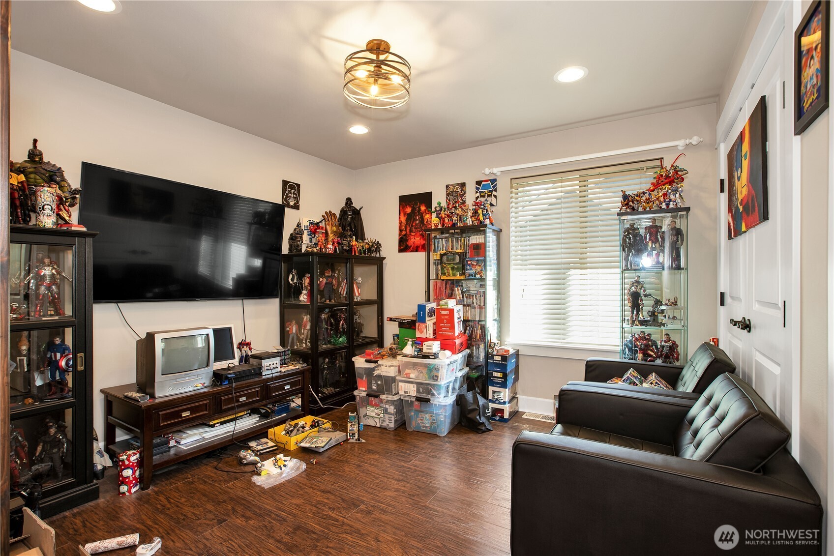 3930 Cameron Drive Northeast Lacey, WA 98516 - Photo 27 of 40 a living room with furniture and a flat screen tv