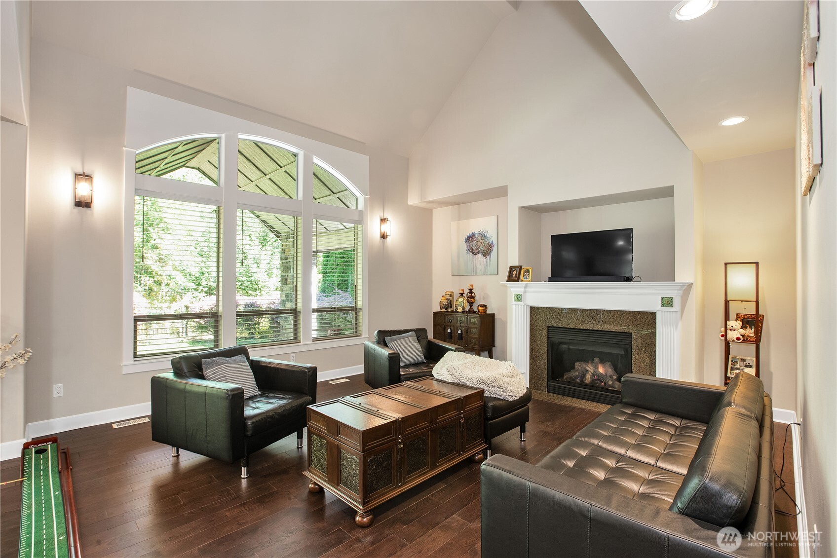 3930 Cameron Drive Northeast Lacey, WA 98516 - Photo 6 of 40 a living room with furniture and a fireplace