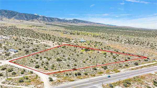 a view of yard with an outdoor space