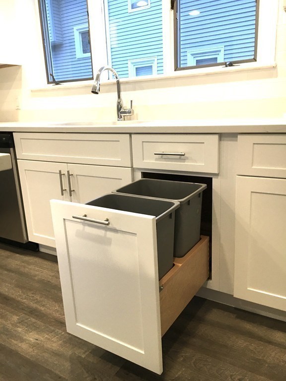 31 Wellington Road Medford, MA 02155 - Photo 3 of 11 a utility room with dryer and washer
