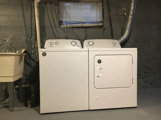 a utility room with dryer and washer