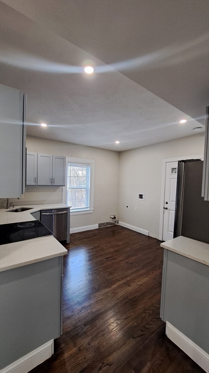 7 Samoset Street, Unit 2 Boston, MA 02124 - Photo 3 of 12 a view of kitchen with wooden floor