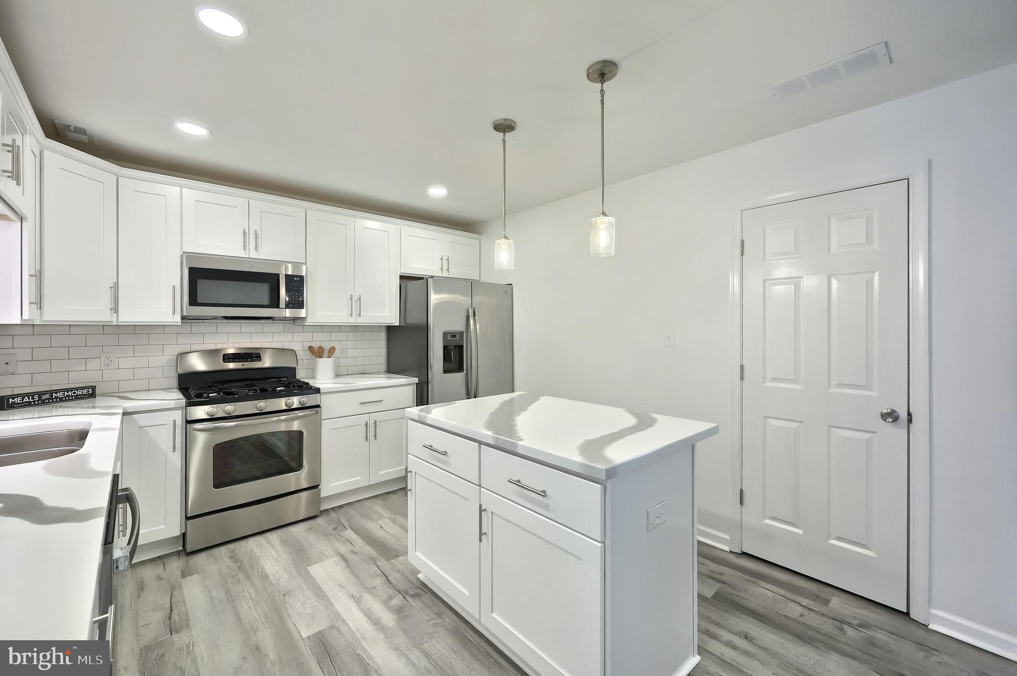 413 Springbrook Court Hanover, PA 17331 - Photo 6 of 30 Fully renovated kitchen features new white cabinet