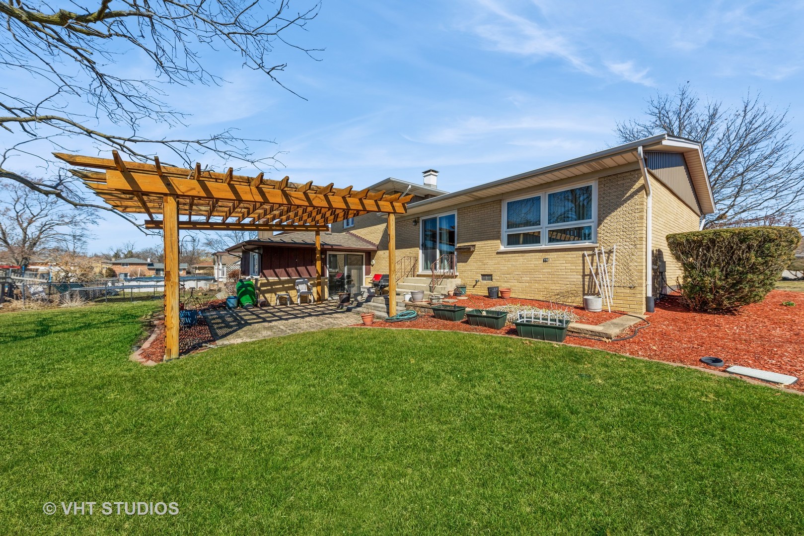 15416 Pine Drive Oak Forest, IL 60452 - Photo 2 of 12 a view of a house with backyard porch and sitting area