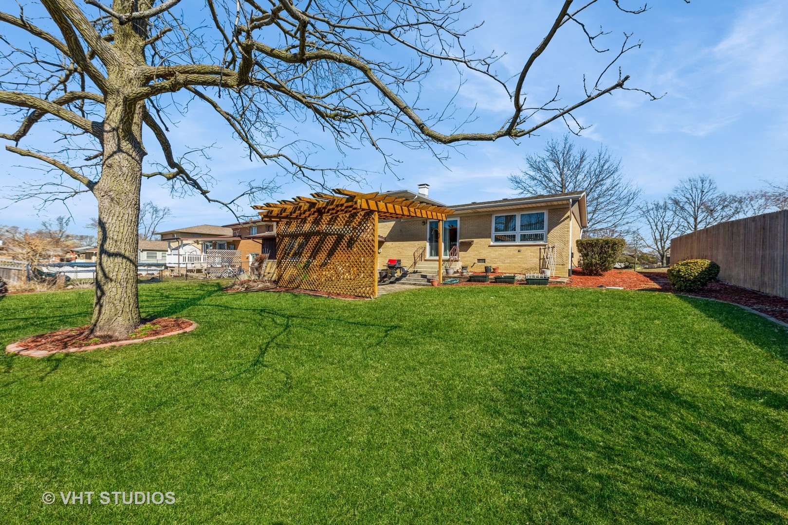 15416 Pine Drive Oak Forest, IL 60452 - Photo 3 of 12 a view of a house with a big yard