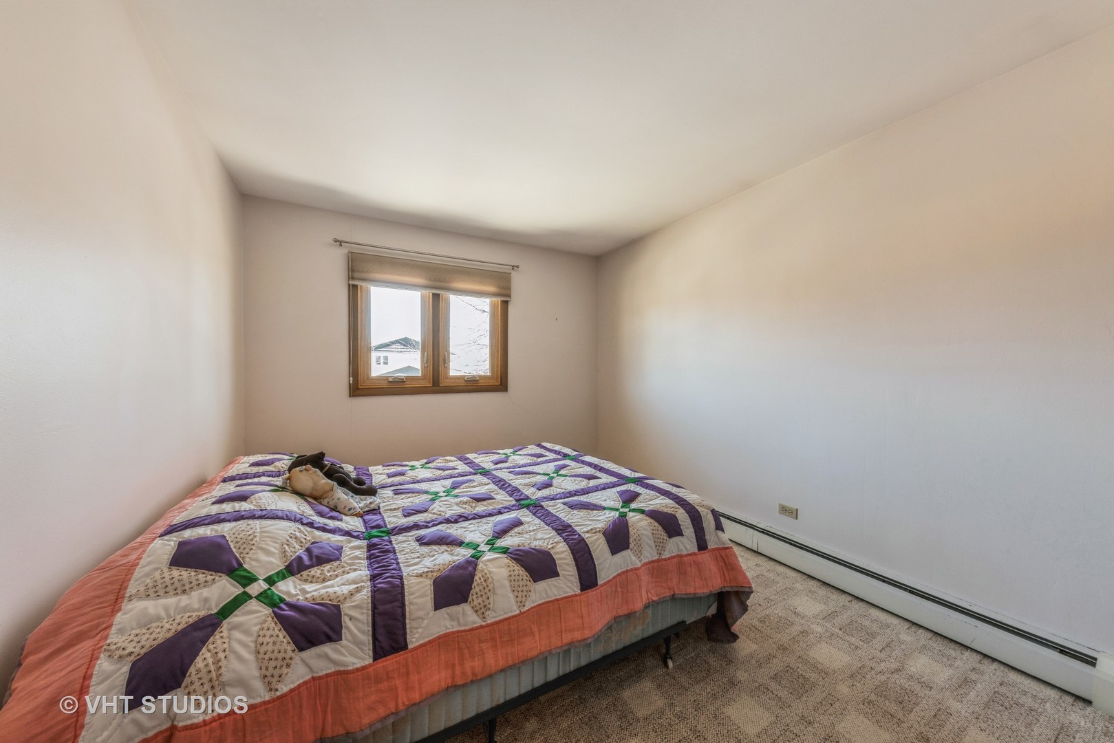 15416 Pine Drive Oak Forest, IL 60452 - Photo 7 of 12 a bedroom with a bed and a window