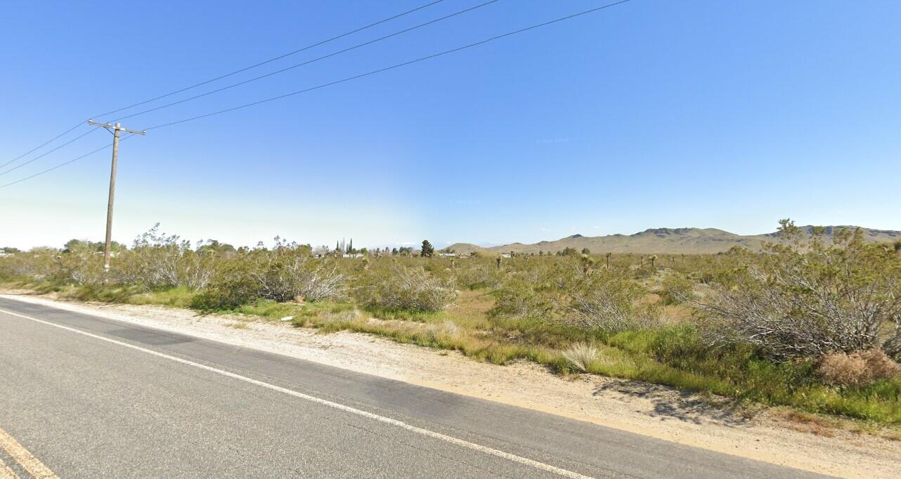 60th Street West Rosamond, CA 93560 - Photo 4 of 25 a view of a road with a mountain view