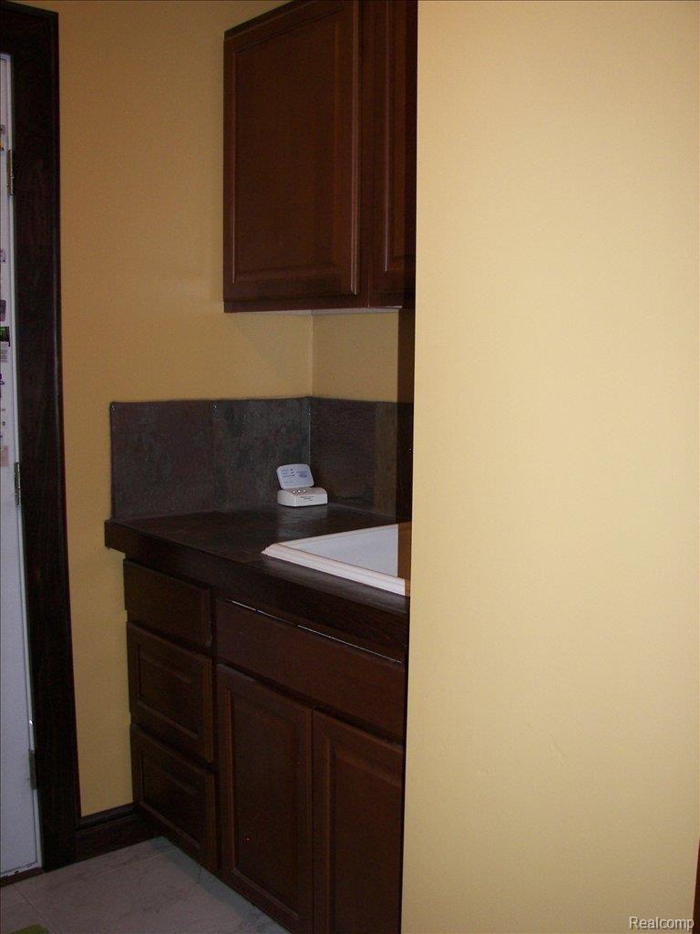 4271 Cahokia Ridge Linden, MI 48451 - Photo 24 of 25 Laundry sink