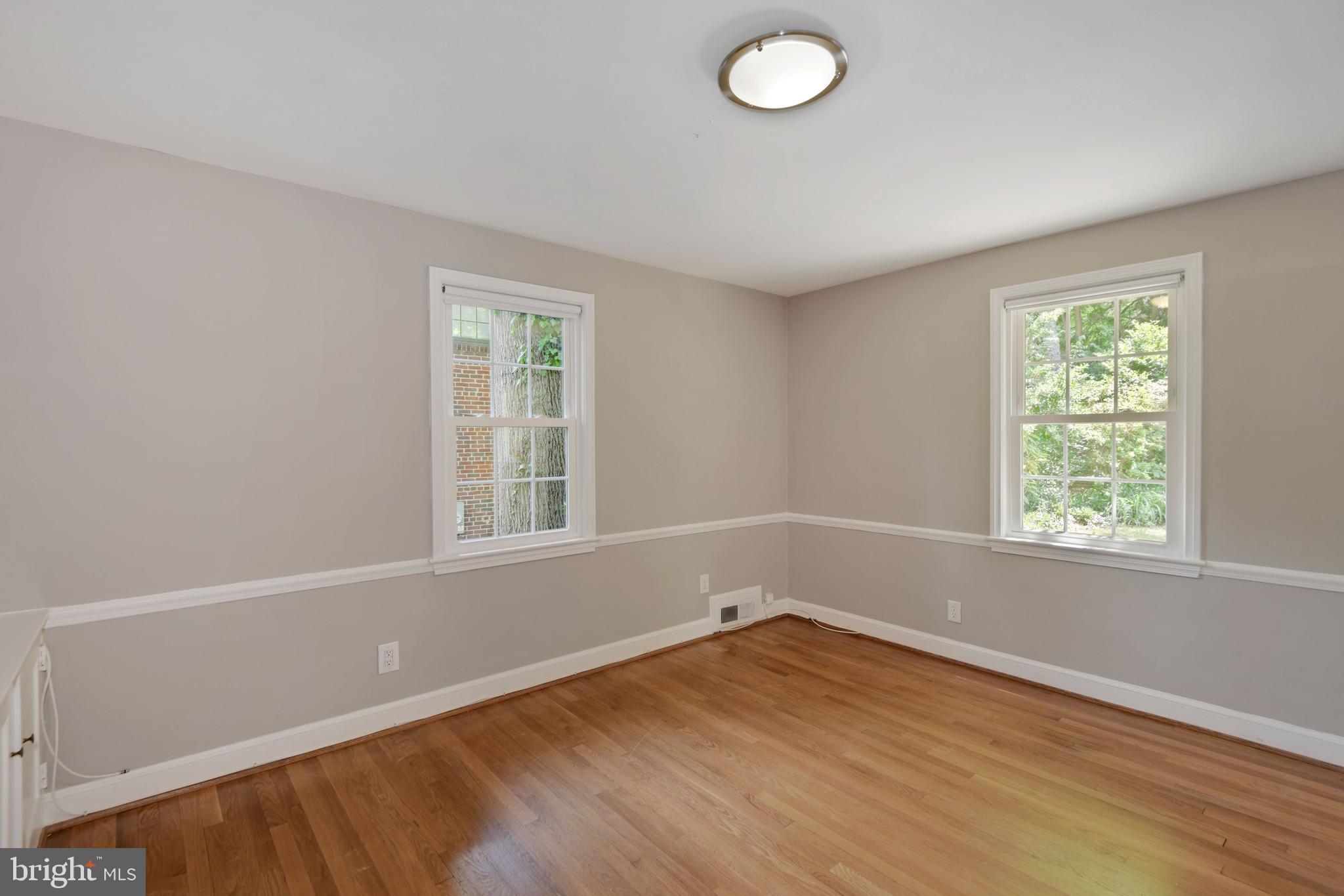 7215 Rollingwood Drive Chevy Chase, MD 20815 - Photo 17 of 42 an empty room with a window