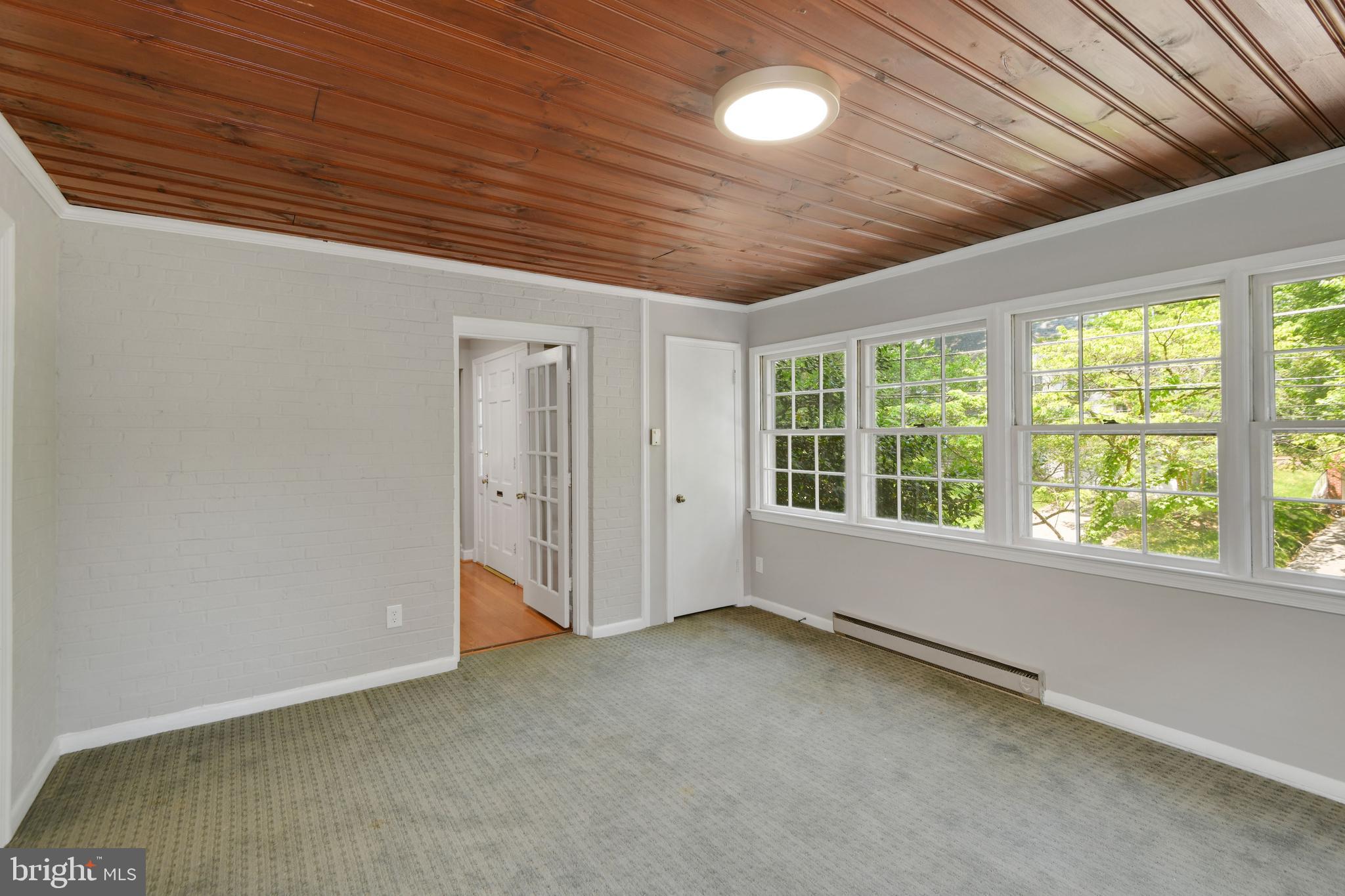 7215 Rollingwood Drive Chevy Chase, MD 20815 - Photo 19 of 42 a view of an empty room with a window