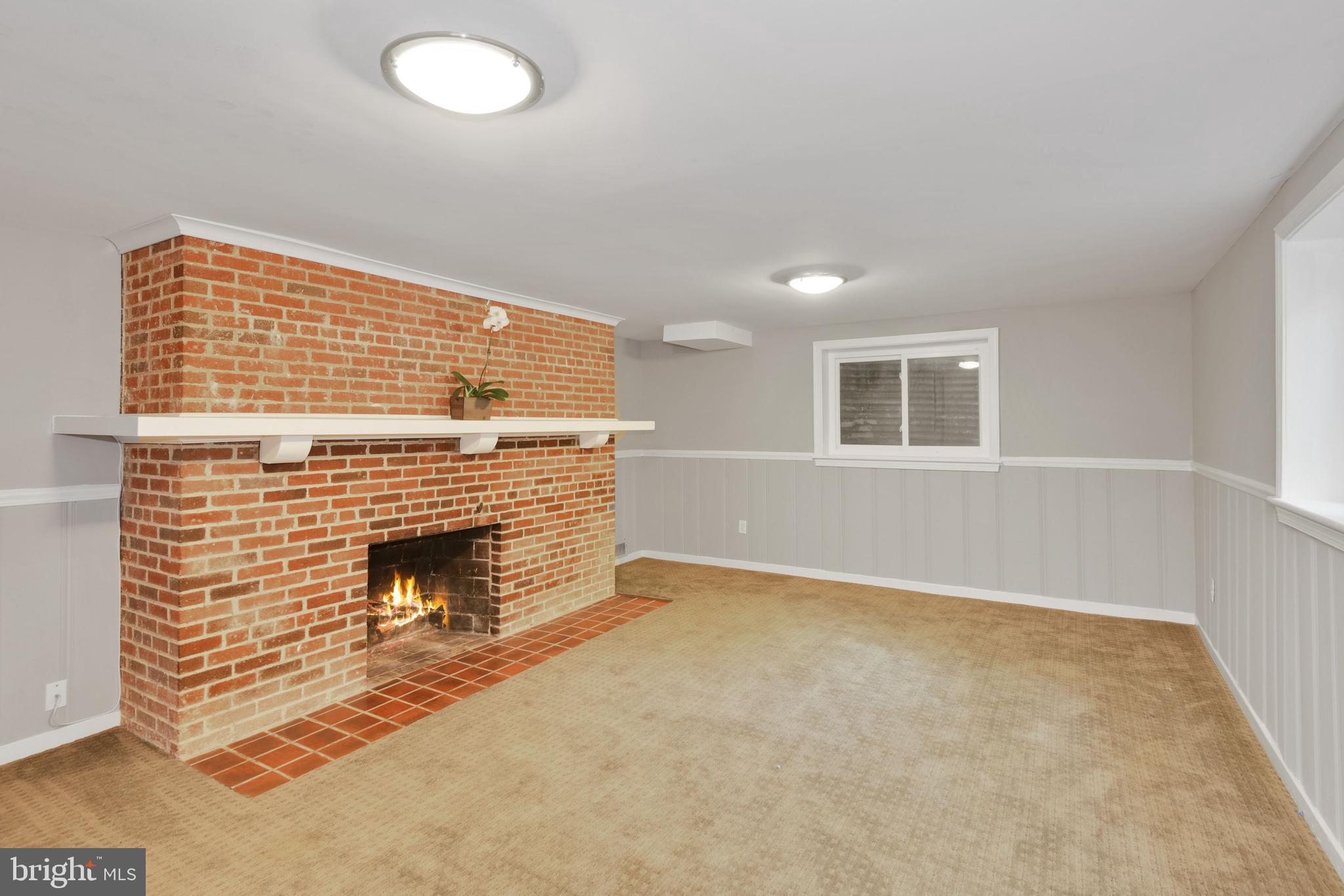 7215 Rollingwood Drive Chevy Chase, MD 20815 - Photo 33 of 42 an empty room with windows