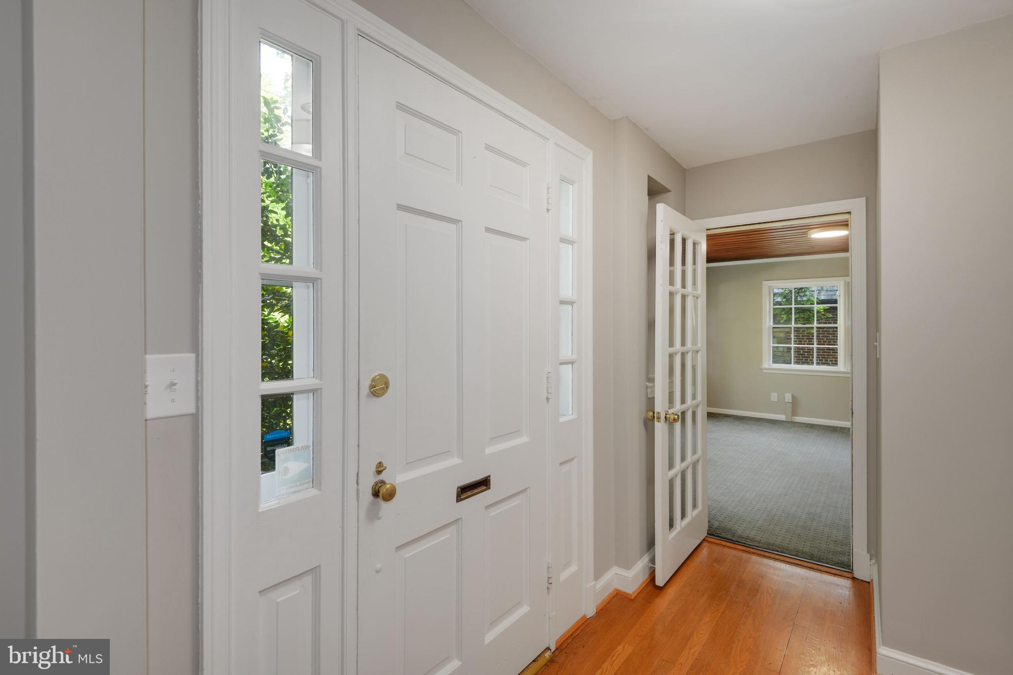 7215 Rollingwood Drive Chevy Chase, MD 20815 - Photo 5 of 42 a view of a livingroom with wooden floor