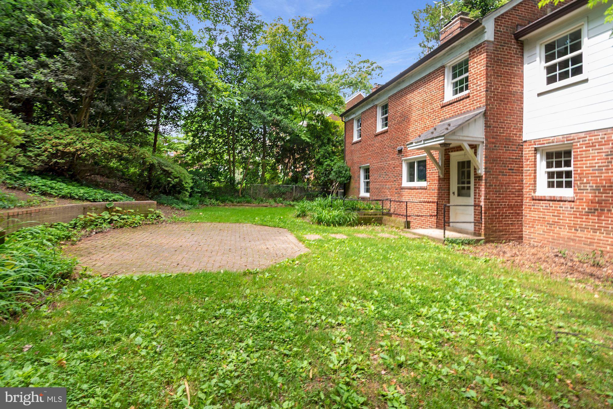 7215 Rollingwood Drive Chevy Chase, MD 20815 - Photo 41 of 42 front view of a house with a yard