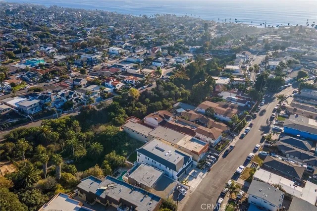an aerial view of a city with lots of residential buildings