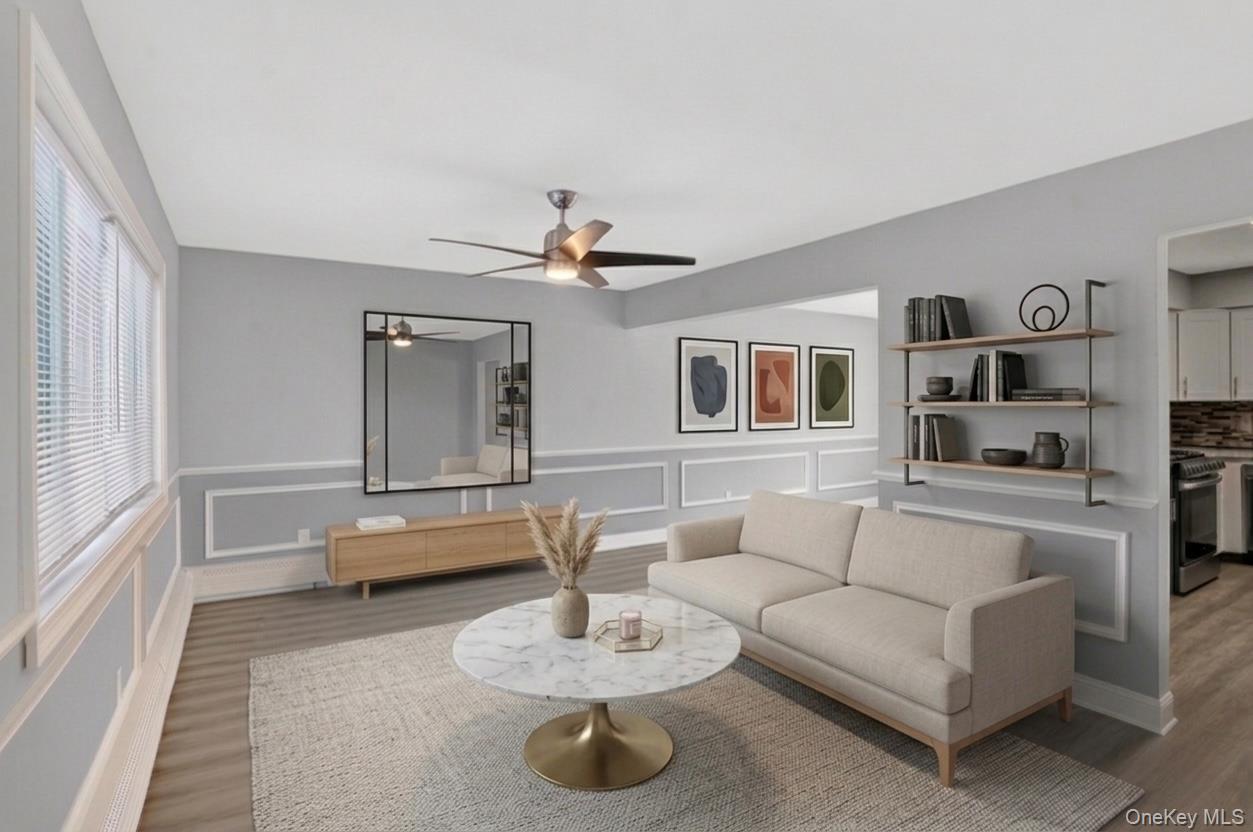 15 North Aspen Road Middletown, NY 10940 - Photo 1 of 16 a living room with furniture and a wooden floor