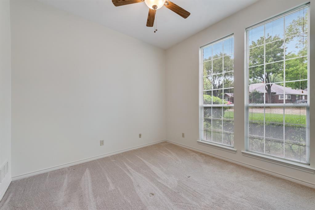 907 Sunpoint Circle Rockwall, TX 75087 - Photo 27 of 37 en empty room with windows