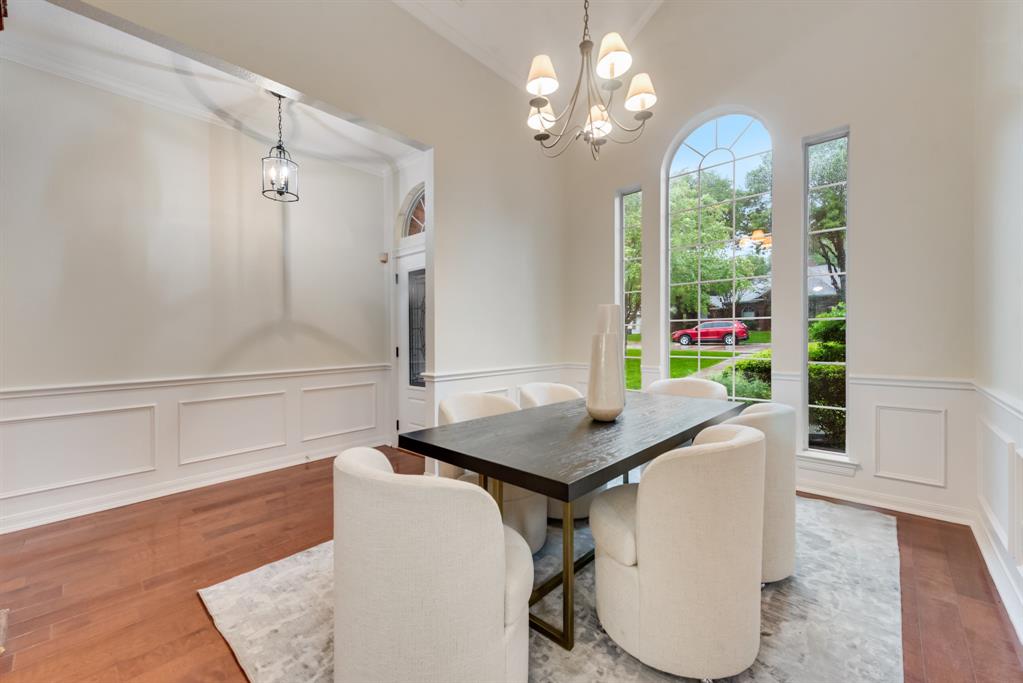 907 Sunpoint Circle Rockwall, TX 75087 - Photo 4 of 37 a dining room with furniture and window