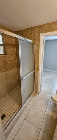 a view of kitchen with furniture and wooden floor