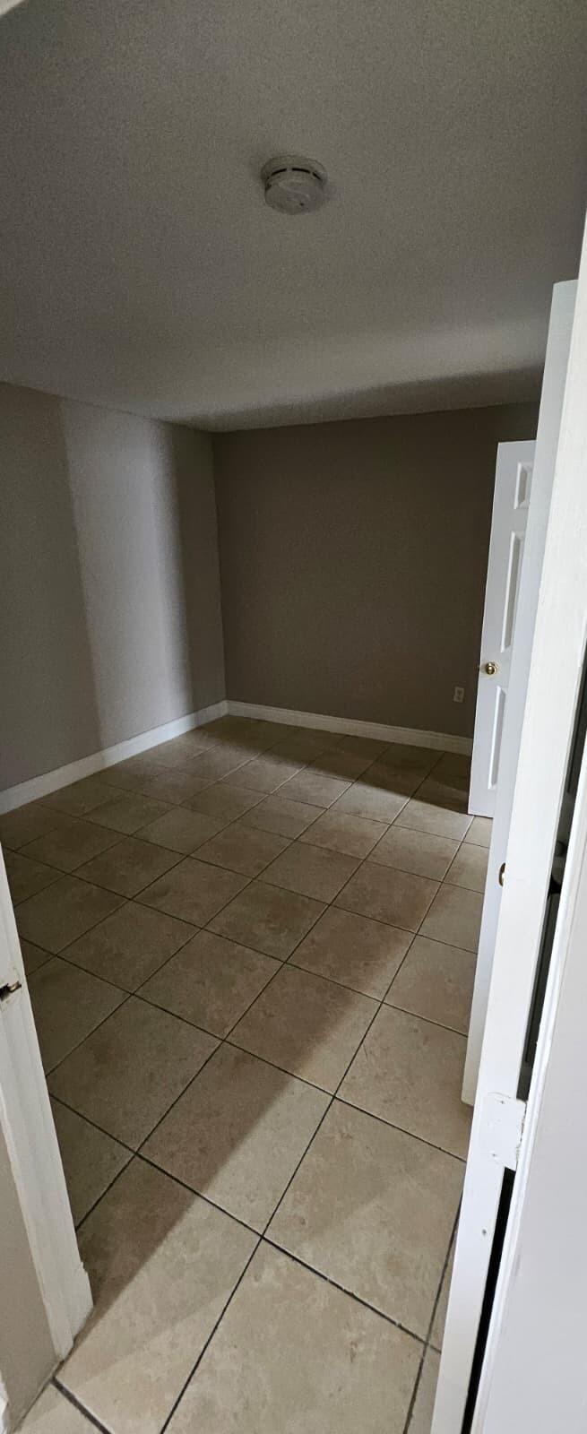 1202 Summer Street, Unit 1202 Palm Springs, FL 33461 - Photo 19 of 32 a view of empty room