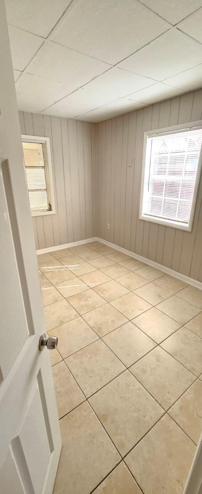 1202 Summer Street, Unit 1202 Palm Springs, FL 33461 - Photo 25 of 32 a view of an empty room with a window