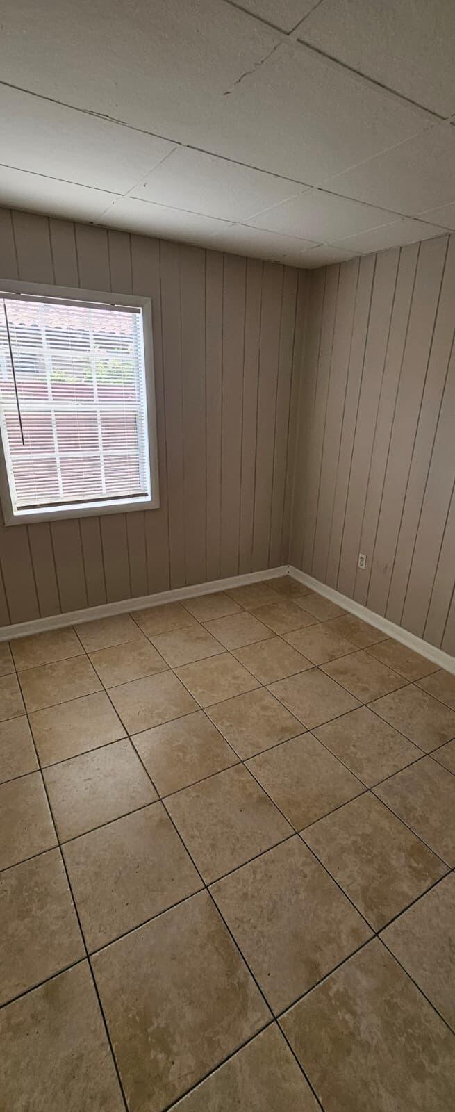 1202 Summer Street, Unit 1202 Palm Springs, FL 33461 - Photo 26 of 32 a view of an empty room and window