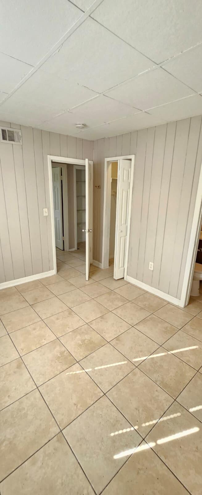 1202 Summer Street, Unit 1202 Palm Springs, FL 33461 - Photo 28 of 32 a view of an empty room with a window