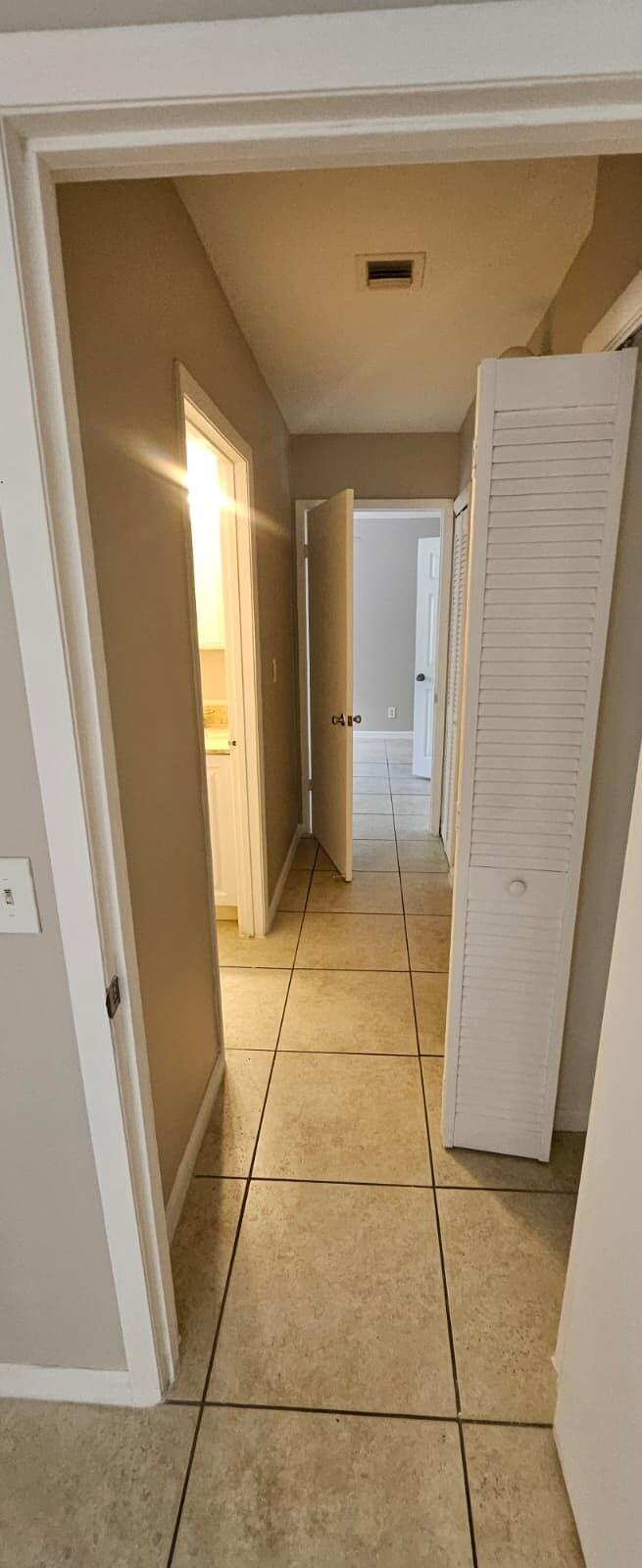 1202 Summer Street, Unit 1202 Palm Springs, FL 33461 - Photo 6 of 32 a bath room with a toilet