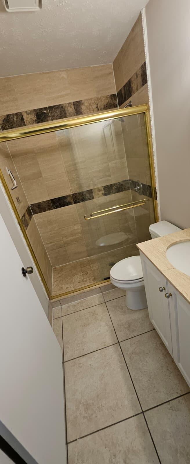 1202 Summer Street, Unit 1202 Palm Springs, FL 33461 - Photo 8 of 32 a view of bathroom with a washer and dryer