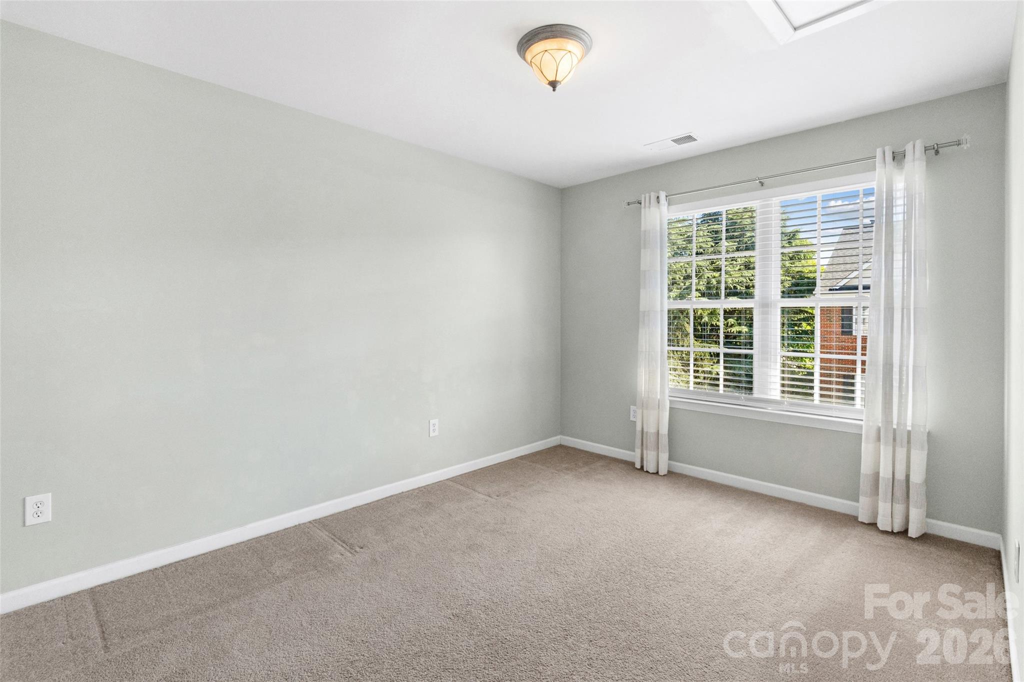 104 Rock Ridge Lane Mount Holly, NC 28120 - Photo 35 of 48 an empty room with a window
