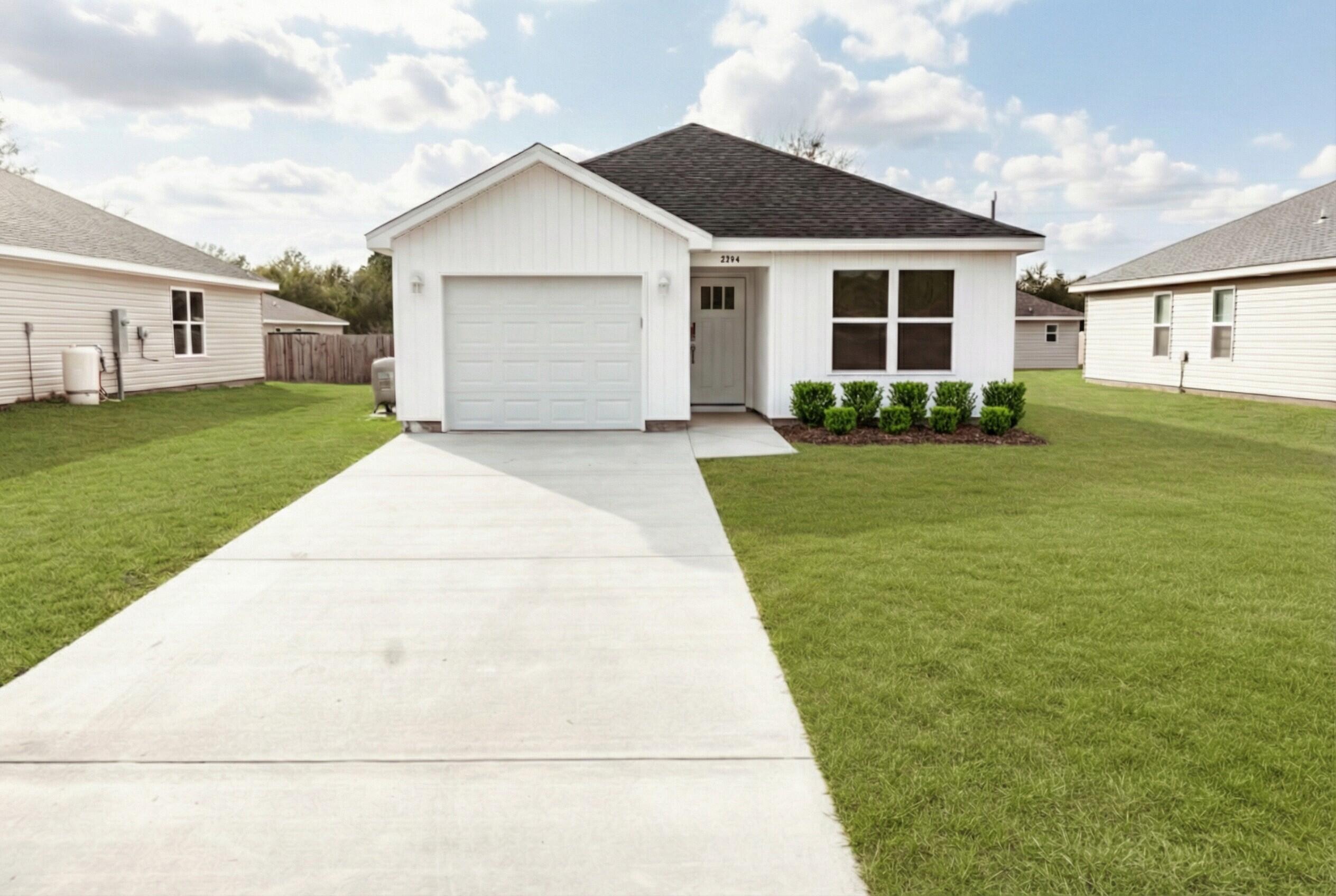 5352 Highview Drive Crestview, FL 32539 - Photo 2 of 32 a view of a yard in front view of a house