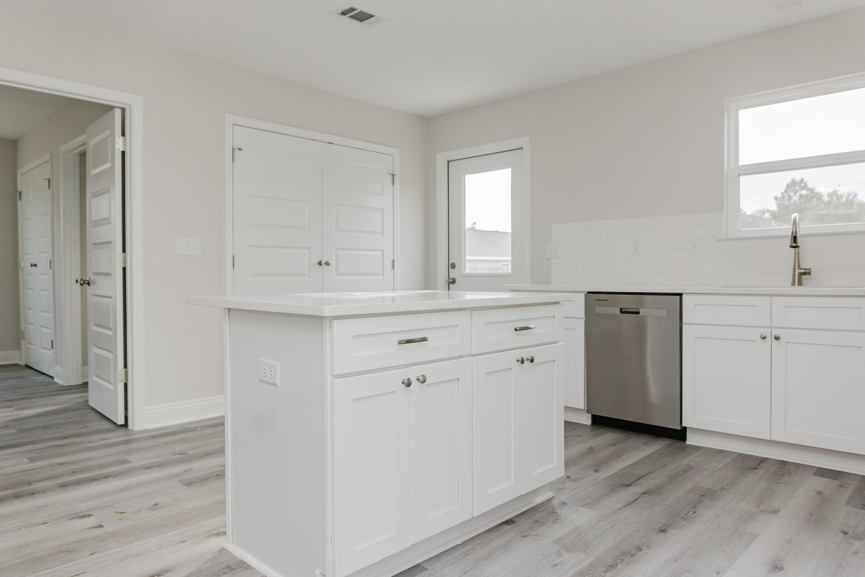 5352 Highview Drive Crestview, FL 32539 - Photo 21 of 32 a view wooden cabinets with wooden floor