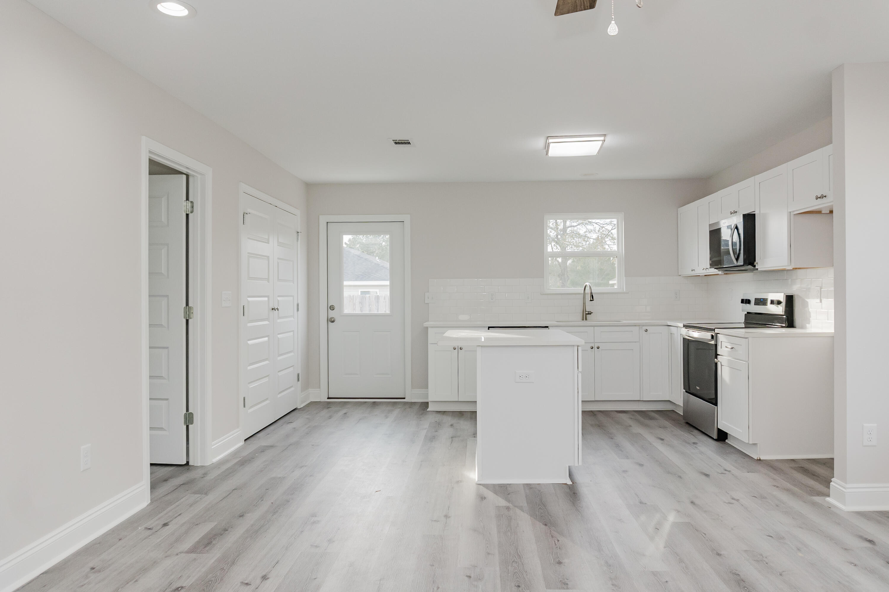 5352 Highview Drive Crestview, FL 32539 - Photo 23 of 32 a view of a kitchen with sink and cabinets