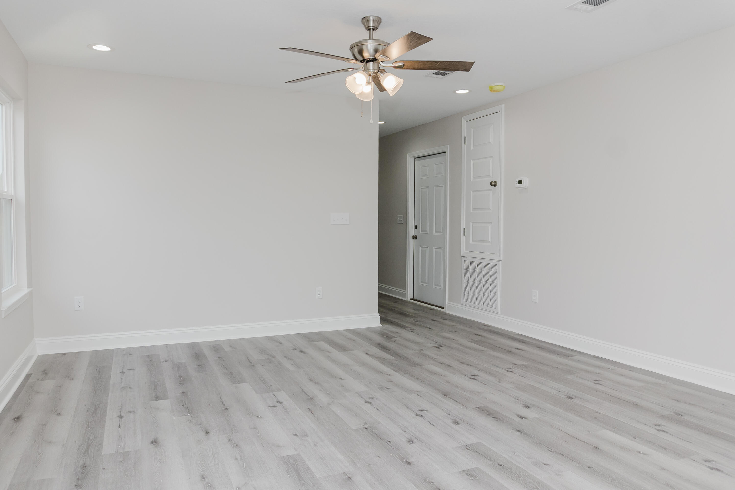 5352 Highview Drive Crestview, FL 32539 - Photo 25 of 32 a view of an empty room with a fan