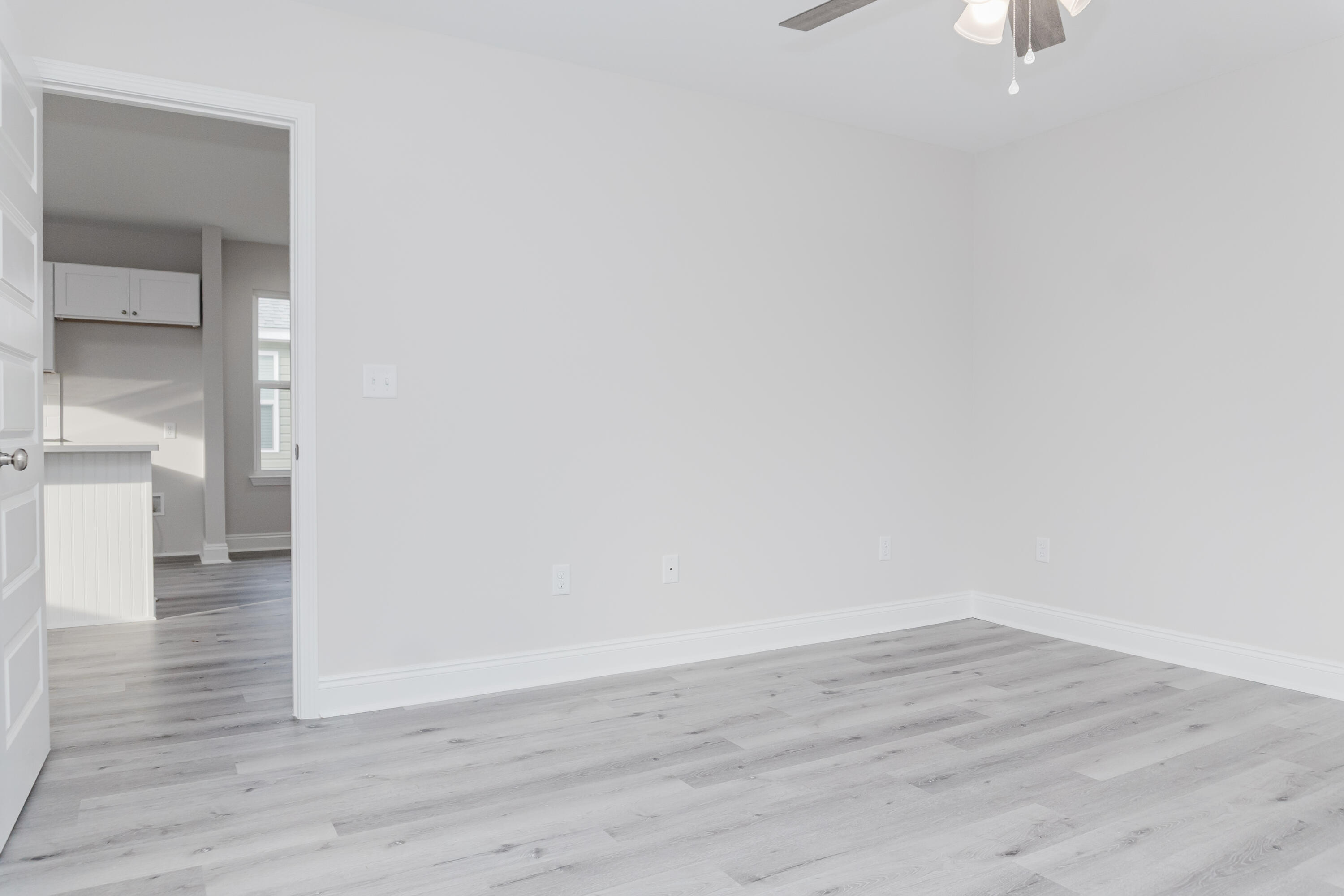 5352 Highview Drive Crestview, FL 32539 - Photo 28 of 32 a view of empty room with wooden floor