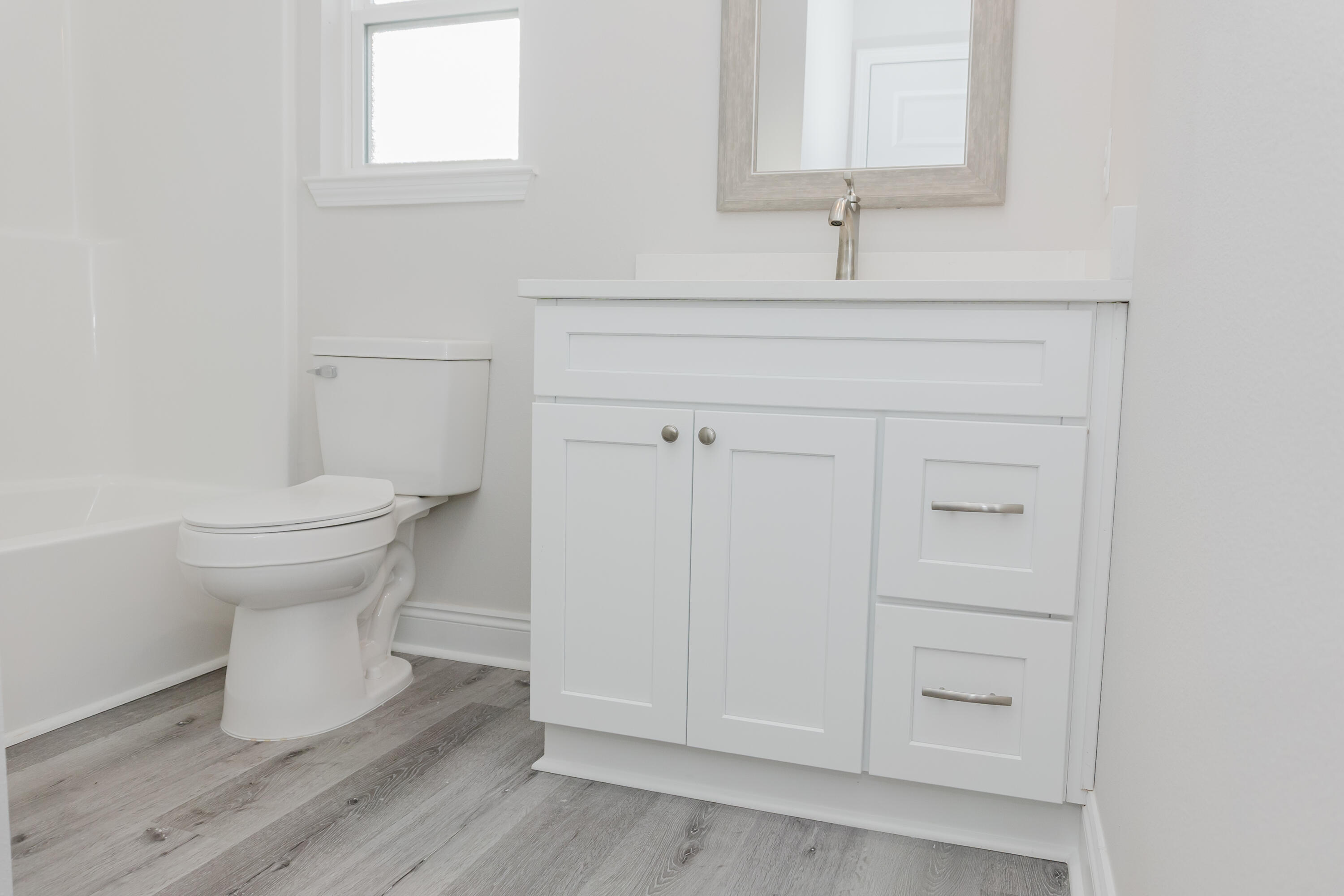 5352 Highview Drive Crestview, FL 32539 - Photo 30 of 32 a bathroom with a sink and a toilet