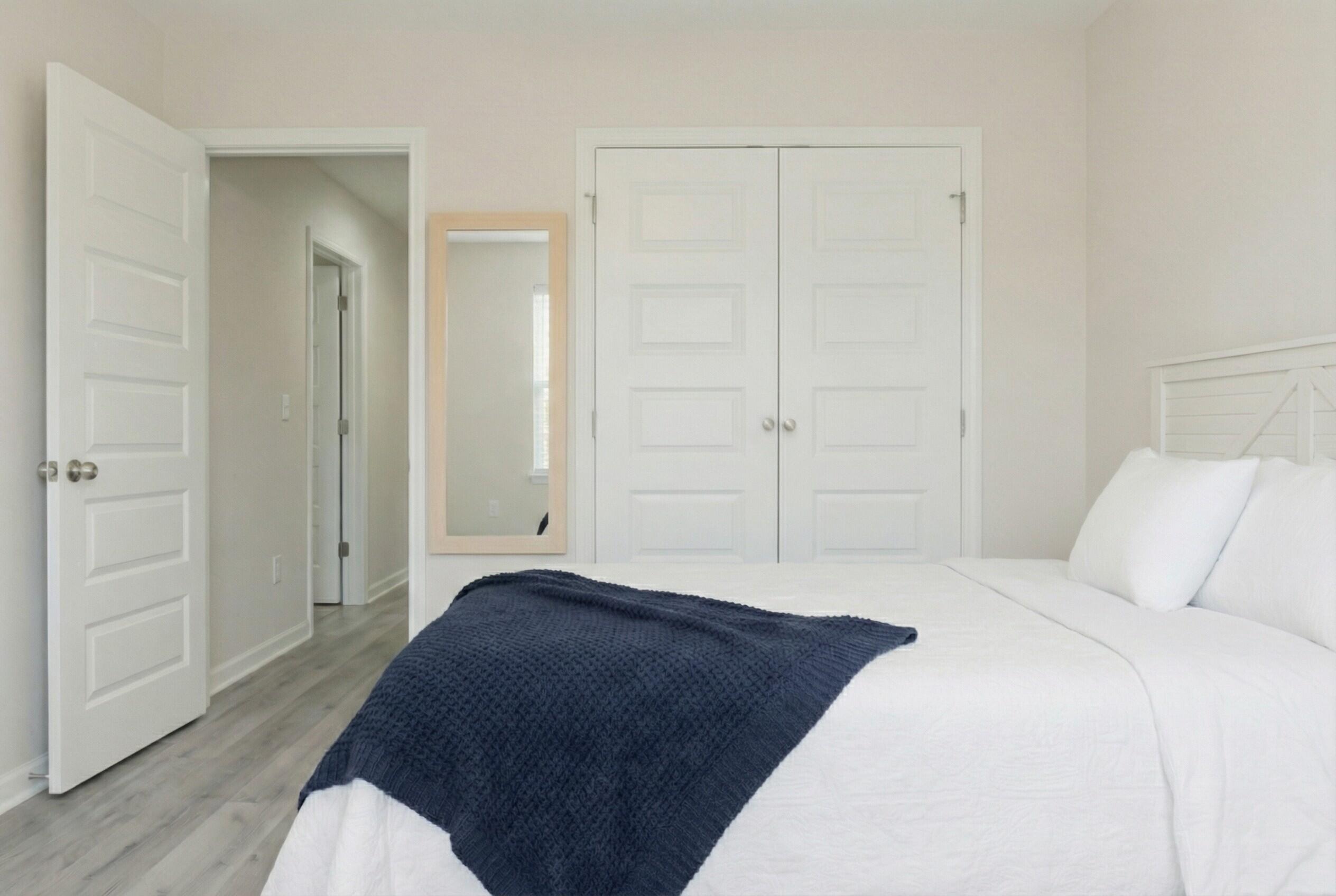 5352 Highview Drive Crestview, FL 32539 - Photo 5 of 32 a bedroom with a bed and wooden floor