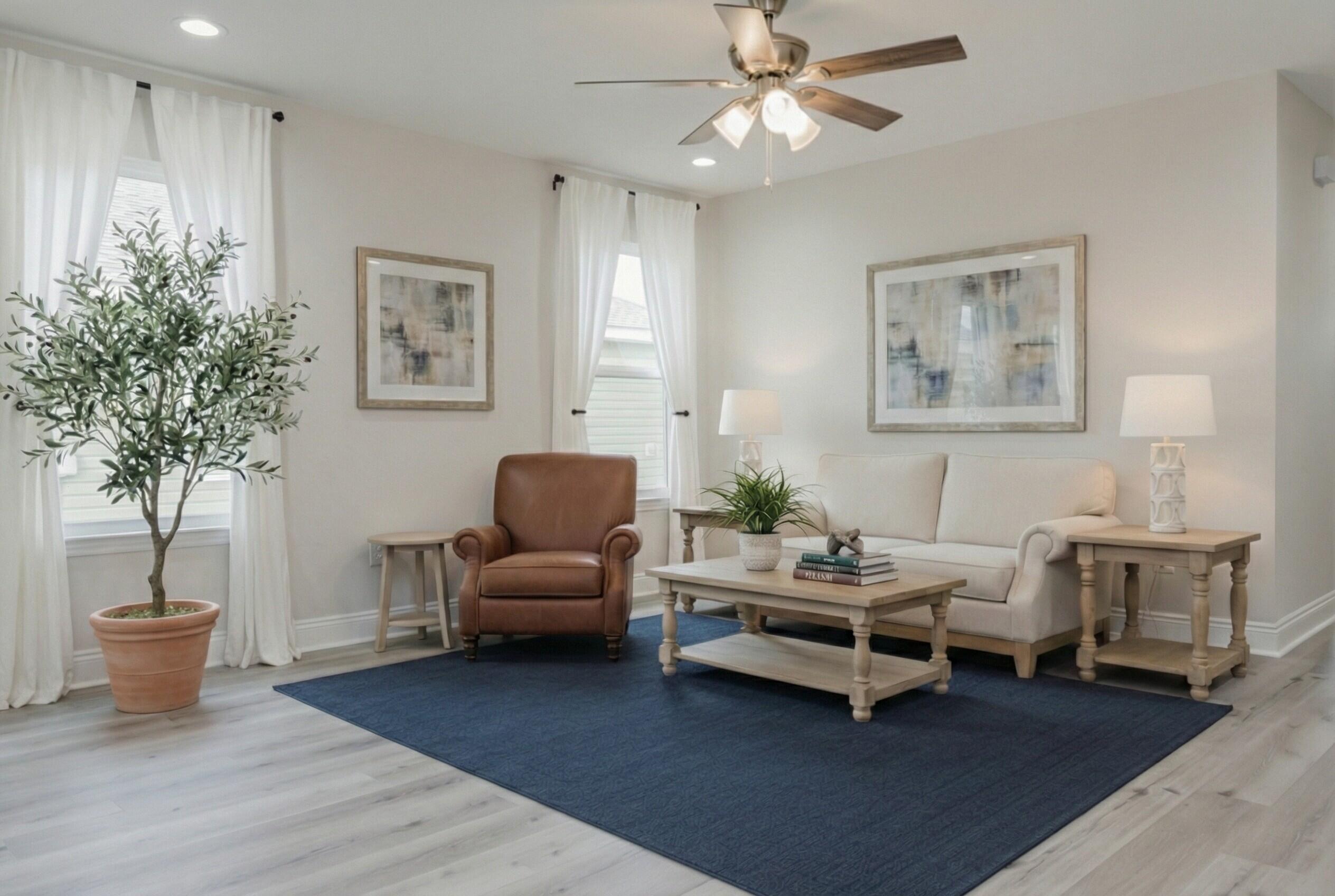 5352 Highview Drive Crestview, FL 32539 - Photo 7 of 32 a living room with furniture and a potted plant