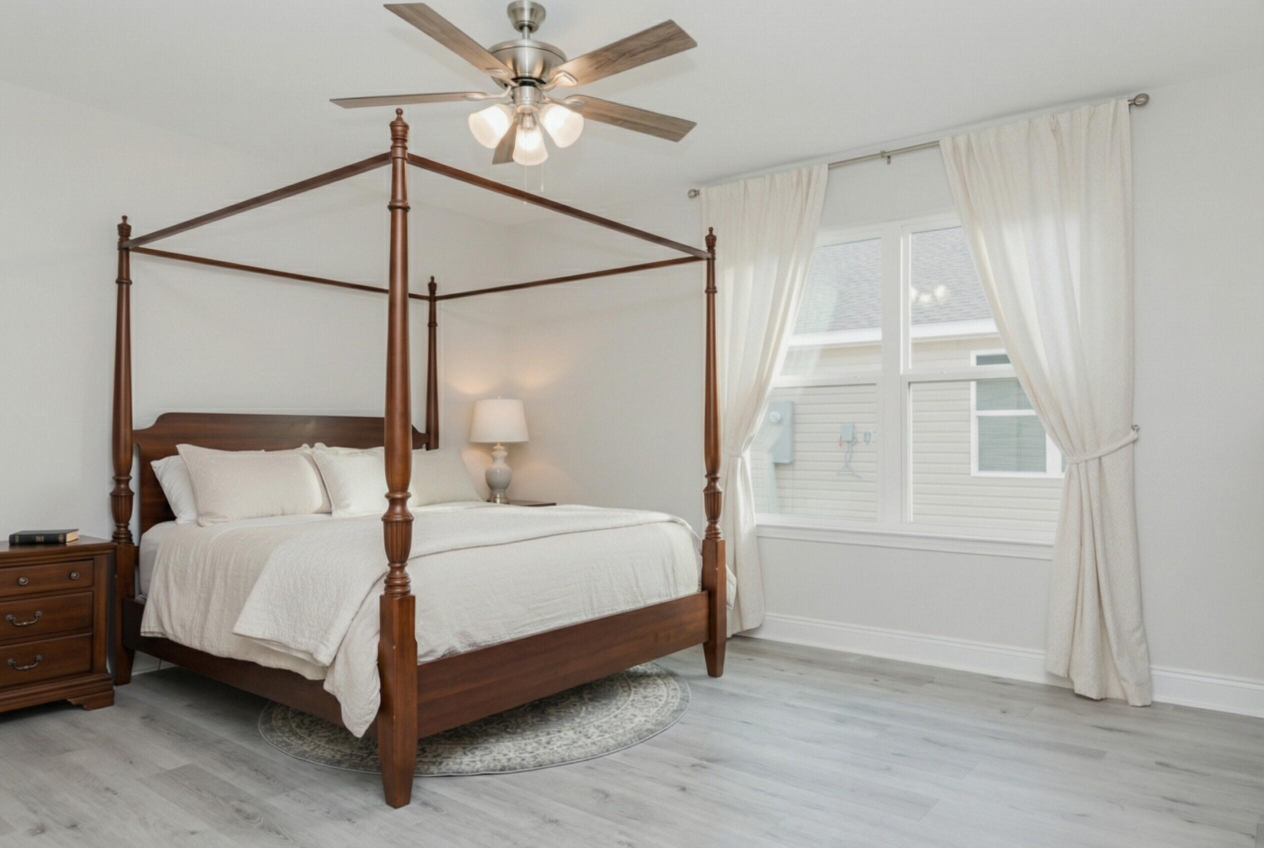 5352 Highview Drive Crestview, FL 32539 - Photo 10 of 32 a bedroom with a bed and a window