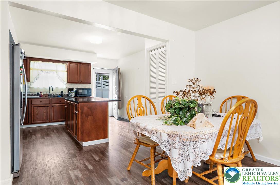 326 Chestnut Street Slatington, PA 18080 - Photo 7 of 28 a dining room with furniture and wooden floor