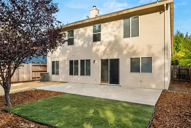 a front view of a house with garage
