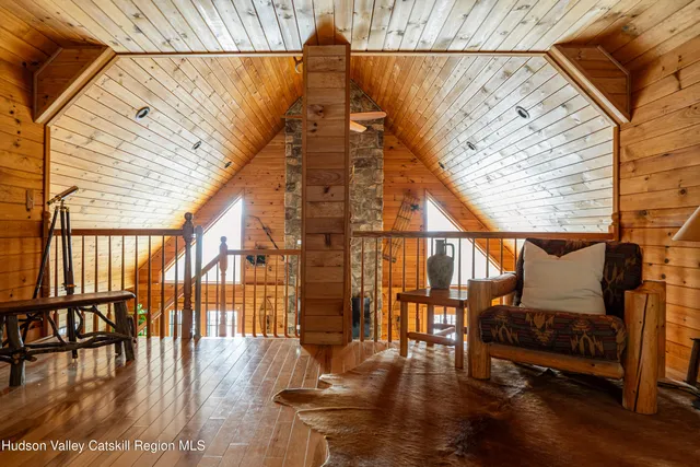 a bathroom with a shower sink and mirror