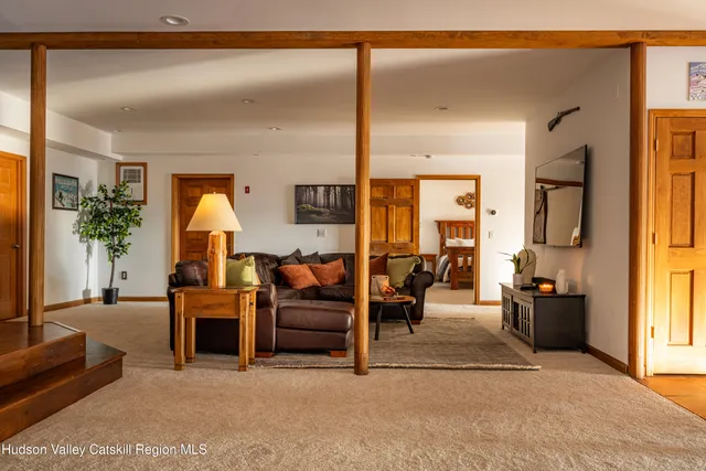 a view of a backyard with table and chairs