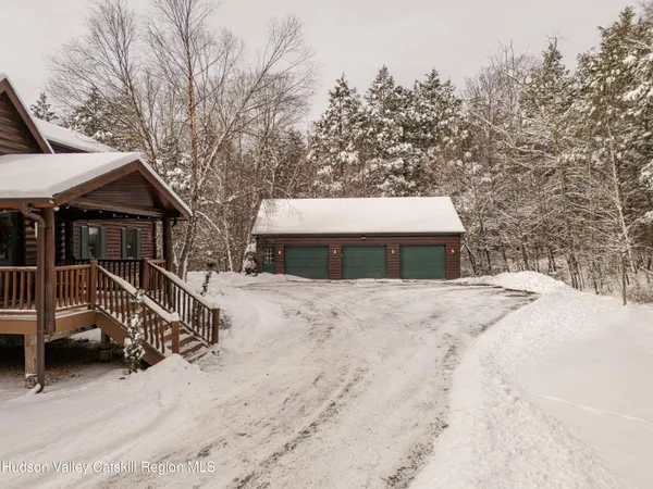 a view of a house with a garage