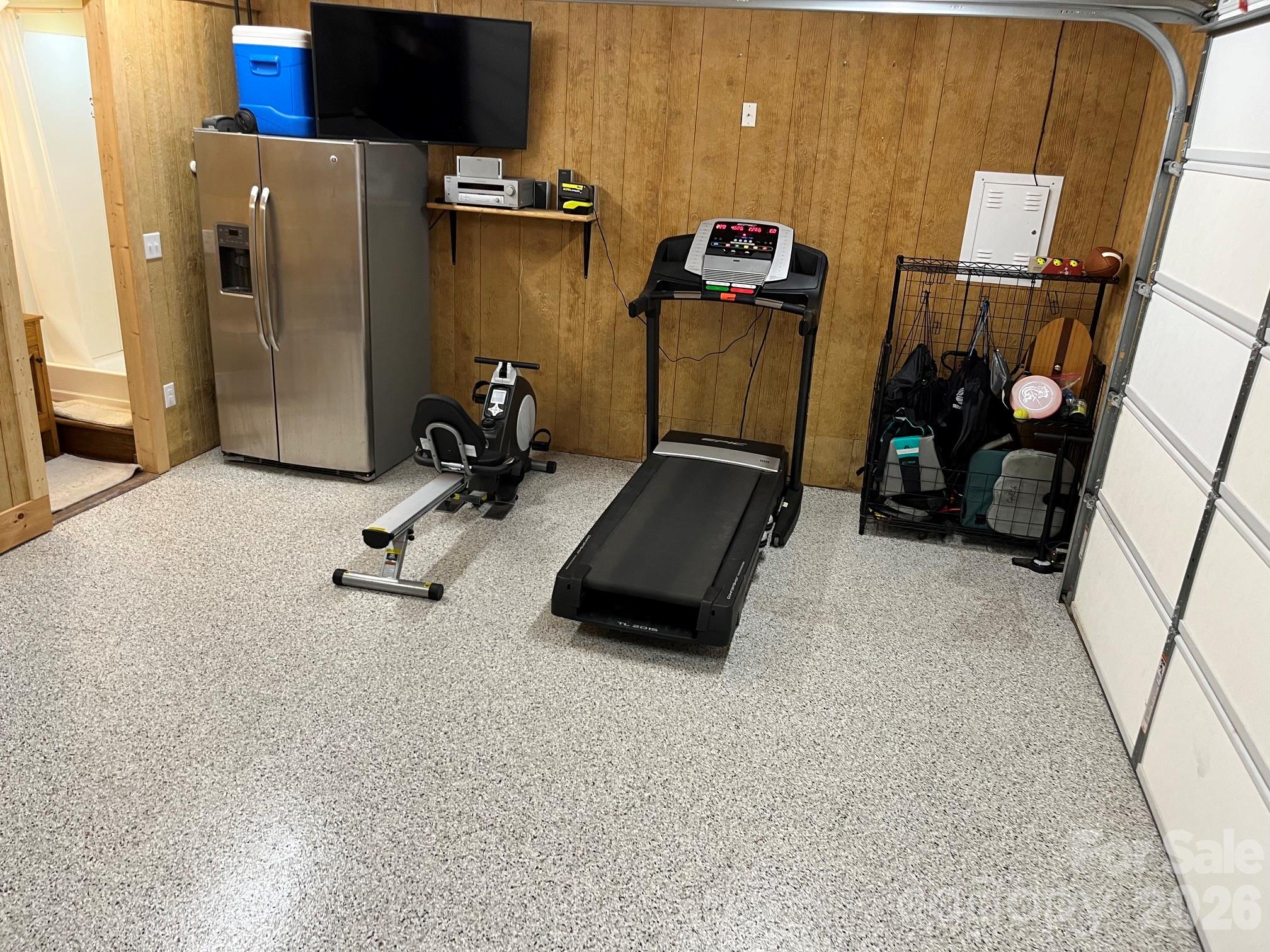 201 Main Street Matthews, NC 28105 - Photo 6 of 16 a view of a room with gym equipment
