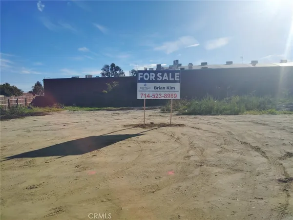 a view of a road with an ocean