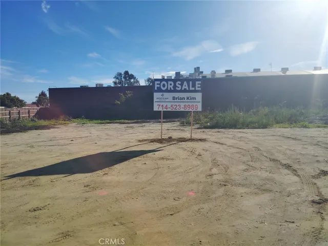 a view of a road with an ocean