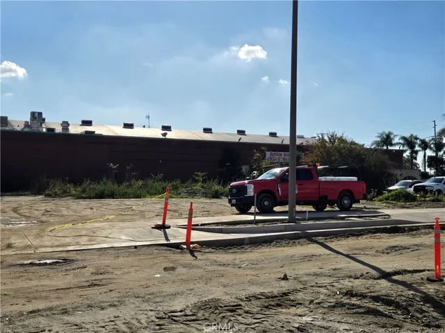 a view of a street with cars