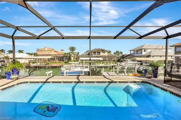 a room with lots of table and chairs