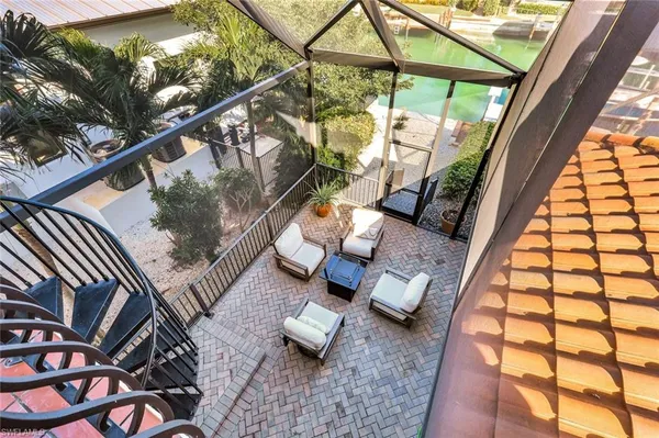 a view of a chairs and table on the terrace
